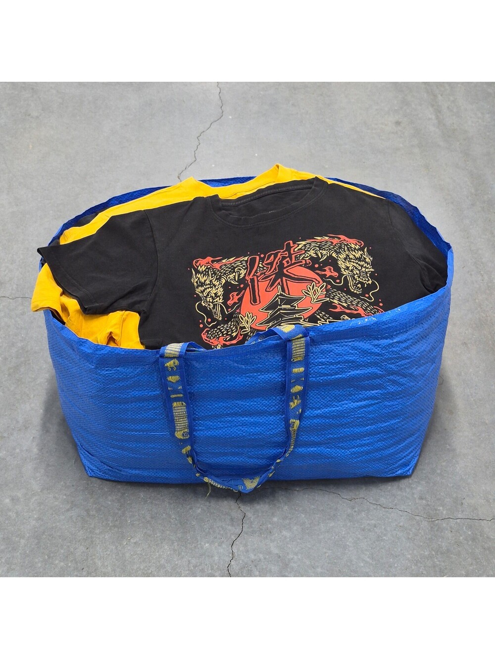 100 Pc Graphic T Shirt Bale